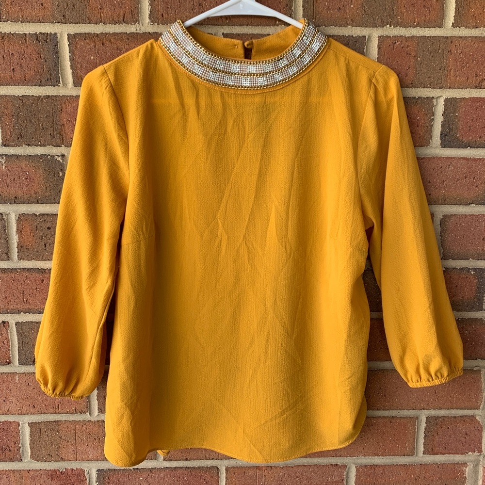Elegant yellow/gold blouse